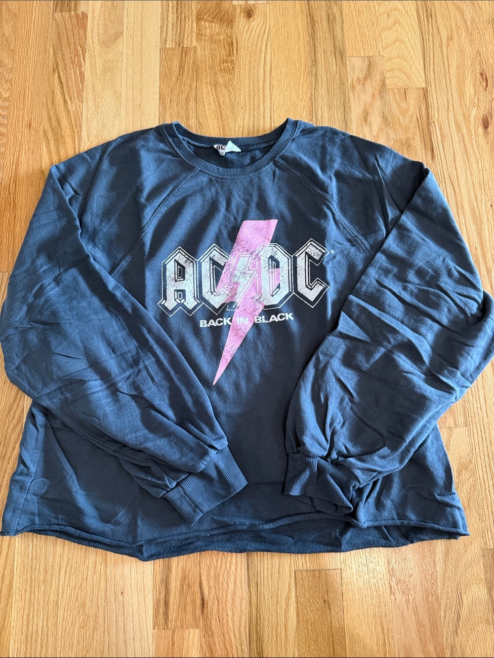 AC/DC Navy Blue Sweatshirt with Pink Lightning Graphic